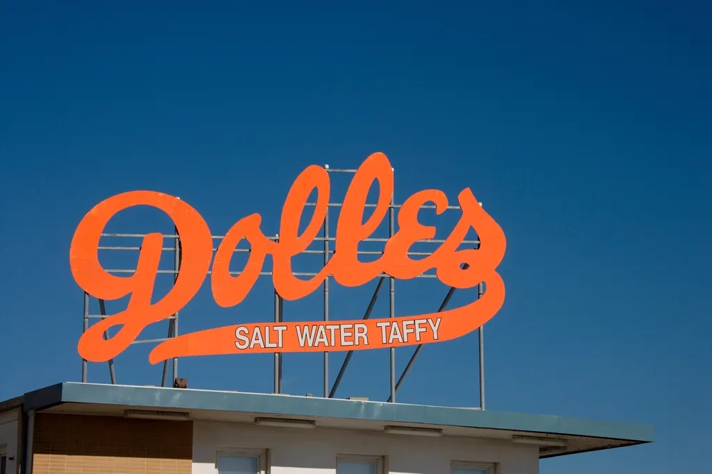 The salt water taffy sign on the boardwalk at Rehoboth Beach, Delaware