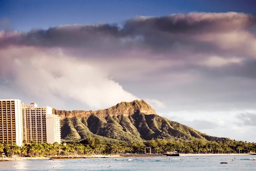 Diamond Head crater rising above the Oahu coastline in Hawaii