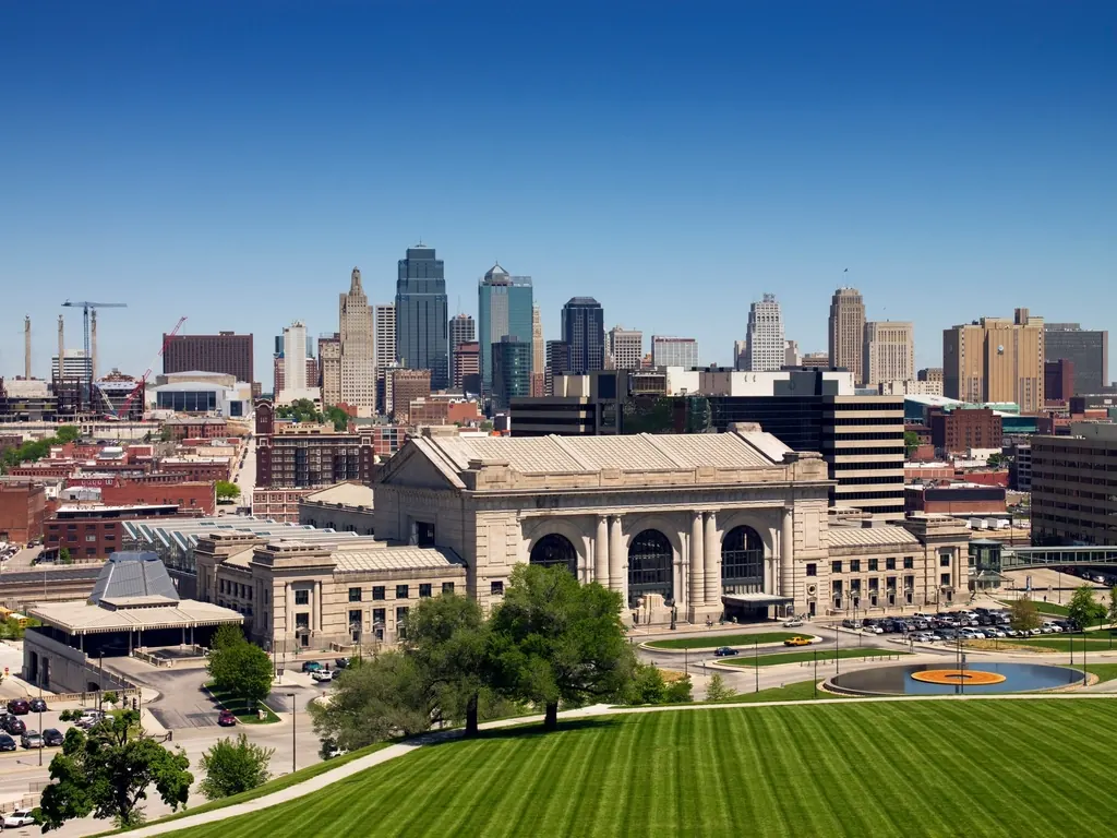 Kansas City Union Station with the downtown skyline behind it