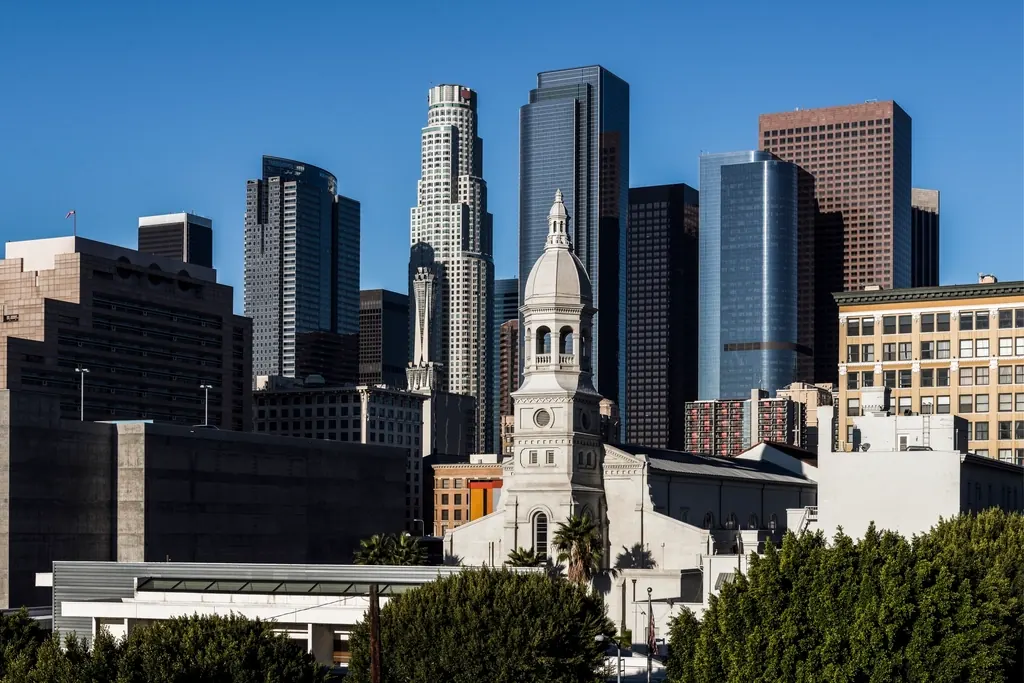 Downtown Los Angeles skyline with palm trees in the foreground