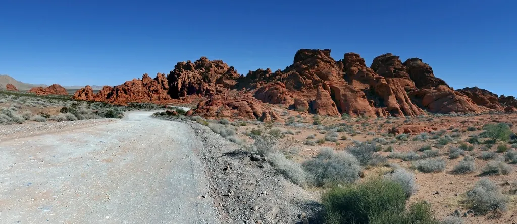 Red sandstone formations and desert road in Valley of Fire, Nevada