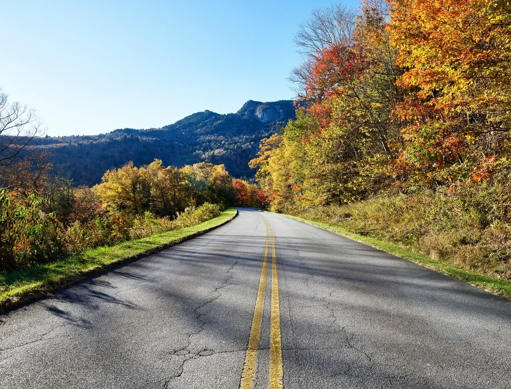 The Blue Ridge Parkway curving through autumn mountains in North Carolina