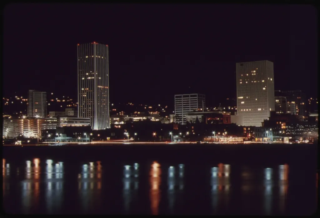 Portland, Oregon skyline lit up at night above the river
