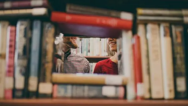 Rows of books on a library shelf