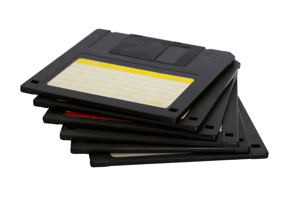 A stack of old floppy disks