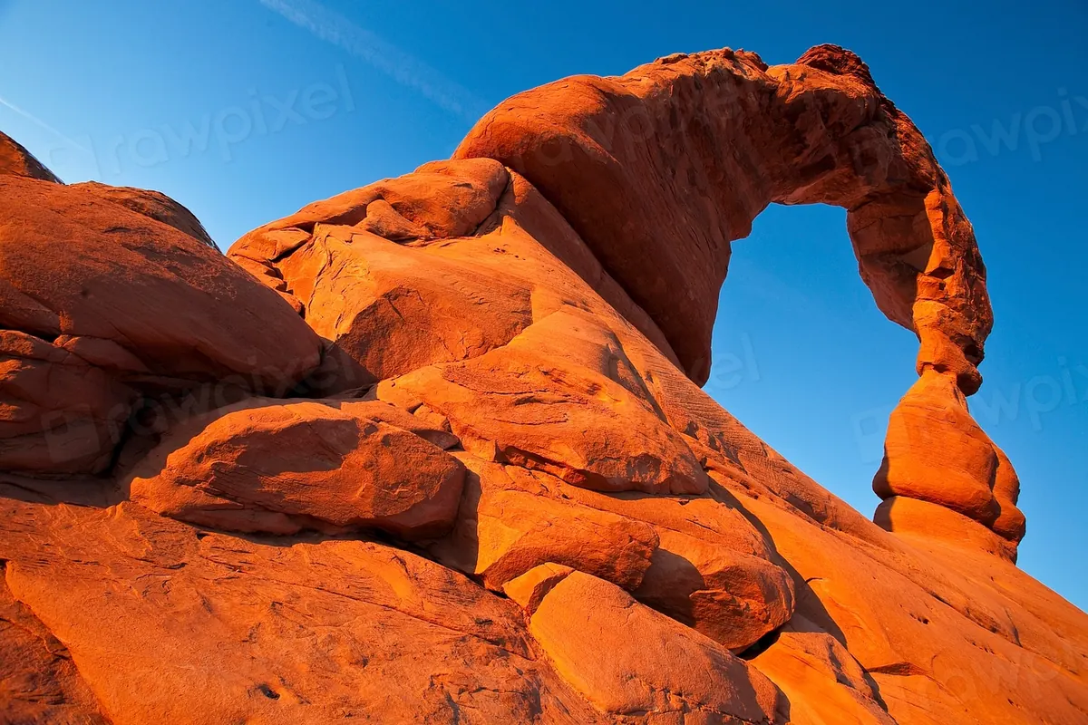 Delicate Arch standing over red rock country in southern Utah