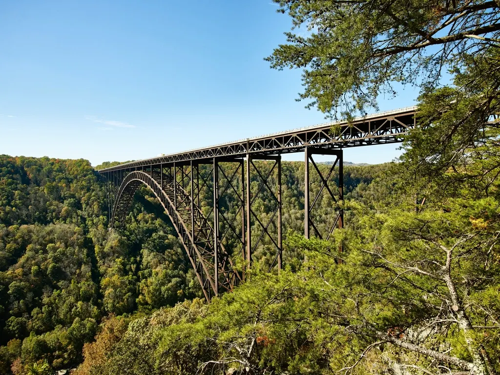 The New River Gorge Bridge spanning a forested canyon in West Virginia